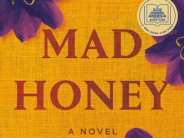 Honey colored background with purple flowers